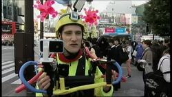 Briton aims to tackle marathon wearing "iRun" suit News Clip