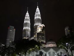 WS View of Petronas Towers at night / Kuala Lumpur, Malaysia Stock Footage
