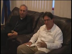 Vatican FM arrives for visit to discuss island's economic plight News Clip