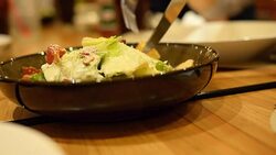 dinner time with salad bowl Stock Footage