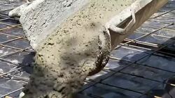 Concrete being poured onto prepared construction foundation. Stock Footage