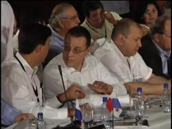 Final day of summit; family photo, Col reax to recall of Ven envoy News Clip