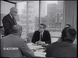 1966: ROBERT COX: VS Men's eyes, Rob holding small meeting in office, Rob sitting in larger meeting w/ others, Pepsi advertising promotion display ad. [VO Rob saying corporate come early, stay late, do homework, more tenacious.] Instructional Video