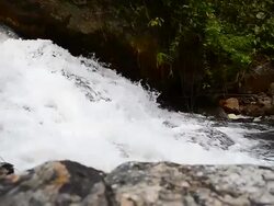 Dolly Shot: Flowing Water at Waterfalls Stock Footage