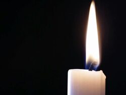 Candle being lit close-up Stock Footage