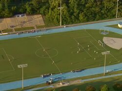 WS AERIAL ZI TS View of womens soccer teams playing at field next to Tennessee River / Chattanooga, Tennessee, United States Stock Footage