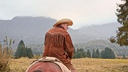 SLO MO Rancher riding on his brown horse Stock Footage