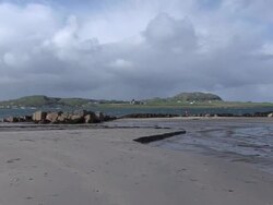 ZI Iona Abbey past body of water / Isle of Iona, Scotland, United Kingdom Stock Footage