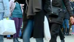 Busy shopping street scenes on Oxford Street during Black Friday News Clip