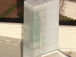 CU AERIAL Shot of big bottle statue at World of Coca Cola company / Georgia, United States Stock Footage