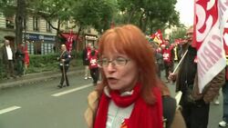 VOICED : French unions march News Clip
