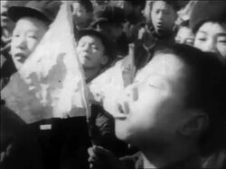 B/W 1960s close up Chinese boy shouting + marching during demonstration / China / educational Stock Footage