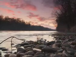 HD Motion Time-Lapse: Cloudscape Over River Stock Footage