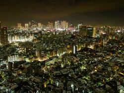 WS T/L View of sunset over shinjuku business and shopping area after snowstorm / Tokyo, Japan Stock Footage