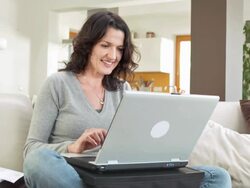 HD DOLLY: Cheerful Woman Chatting On Laptop Stock Footage