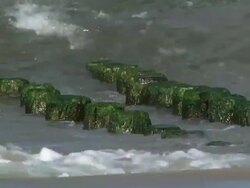 Breakwater at sea - close up + Audio Stock Footage