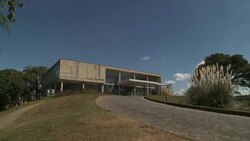 Shrubs and trees beautify an art museum in Belo Horizonte, Brazil. Stock Footage