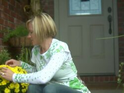 Smiling woman with flowers Stock Footage