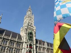 Munich town hall with Bavarian flag Stock Footage