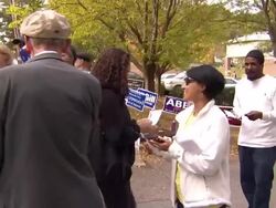 Young voters being bussed to a polling station News Clip