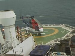 Helicopter on helipad of ship, Australia Stock Footage