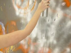 Young woman painting happy smile sign. Stock Footage