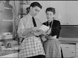 1948: CLAUDIA RADIO SHOW: DRAMATIZATION: Kathyrn Bard & Paul Crabtree ON SET in kitchen, SOT discussing letter from bank, have 'less than no money', 'David' (Paul Crabtree) asking 'Claudia' (Kathyrn Bard) to see her checkbook. Instructional Video