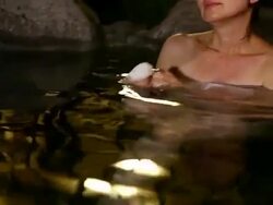 MS TU Shot of Mature woman soaks in a traditional Japanese hot bath called onsen / Yufuin, Oita, Japan Stock Footage