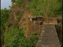 MS ruins of Hindu Temple in jungle, Bandhavgarh National Park, India Stock Footage