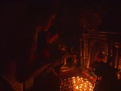 MS PAN Worshippers lighting  candels and ceremoniously ring two large bells  / Kathmandu, Central, Nepal Stock Footage