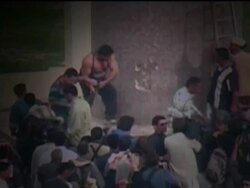 Saddam Hussein Statue Toppled Stock Footage