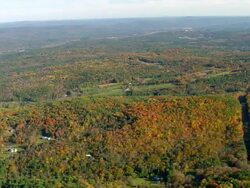 WS AERIAL View of wooded area with mountain range / Vermont, United States Stock Footage