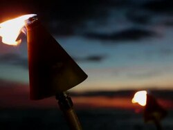 Tiki Torch At Sunset Stock Footage