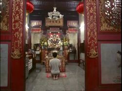 MS Man worshipping at Chinese temple, Chinese New Year, China Stock Footage