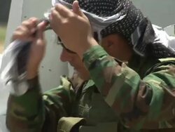 Soldiers Relaxing Near HQ Away From Conflict News Clip