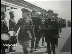 1938: TANGIER (TANGIERS), MOROCCO: FASCIST MILITARY POLICE: Colonel Joaquim de Miguel inspecting Franco's Zone gendarmerie, MS Franco's gendarmes at attention, Colonel Joaquim de Miguel saluting, reviewing marching military police force. Instructional Video