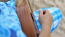 playing ukulele Stock Footage