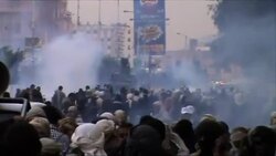 CLEAN : Yemen police tear gas protesters to open airport road News Clip