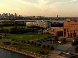 AERIAL, University of Massachusetts campus and downtown skyline across harbor, Boston, Massachusetts, USA Stock Footage