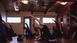 SLO MO Women stretching in yoga class Stock Footage