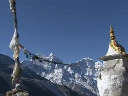 WS Shot of Chorten with Prayer Flags and Mountain Range (Thamaserku & Kangtegra) / Dingboche, Khumbu Region, Nepal Stock Footage