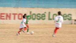 Young Brazilian soccer players dribble and pass ball through opposing team's defense Stock Footage