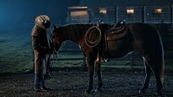 SLO MO Rancher stroking his horse in the evening Stock Footage