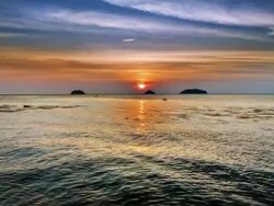 Sunset, sea, island Stock Footage