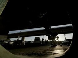 WS SLO MO LA Shot of  skater doing aerial and landing and sliding off board / Venice, California, United States Stock Footage