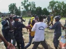 Pro-Tibetan protesters scuffle with police Instructional Video