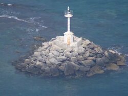 WS AERIAL View of light tower / Parga, Epirus, Greece Stock Footage