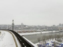 MS PAN Cars drifting through snow on road over Mississippi near Downtown / Saint Paul, Minnesota, United States  Stock Footage