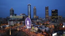 City skyline, elevated view over Downtown and the Centennial Olympic Park in Atlanta, Georgia, United States of America Stock Footage
