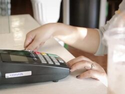Women Swiping A Credit Card,Dolly Shot Stock Footage